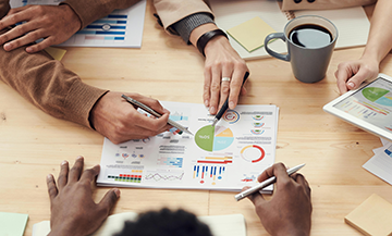 A committee uses a business plan for its renewable energy operation.