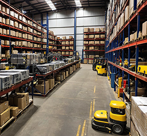 Stockroom shelves showcasing organized inventory management to improve STR.