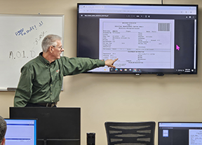 John Appel, instructing an in-house training class for MAPCON