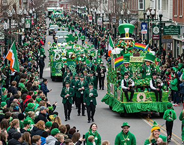 A parade on St. Patrick's Day with products from CMMS enhance facilities.